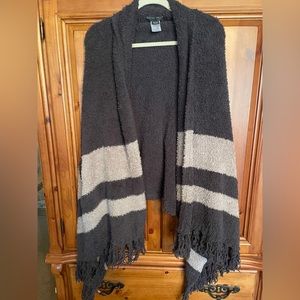 Barefoot dreams wrap/poncho with arm holes.